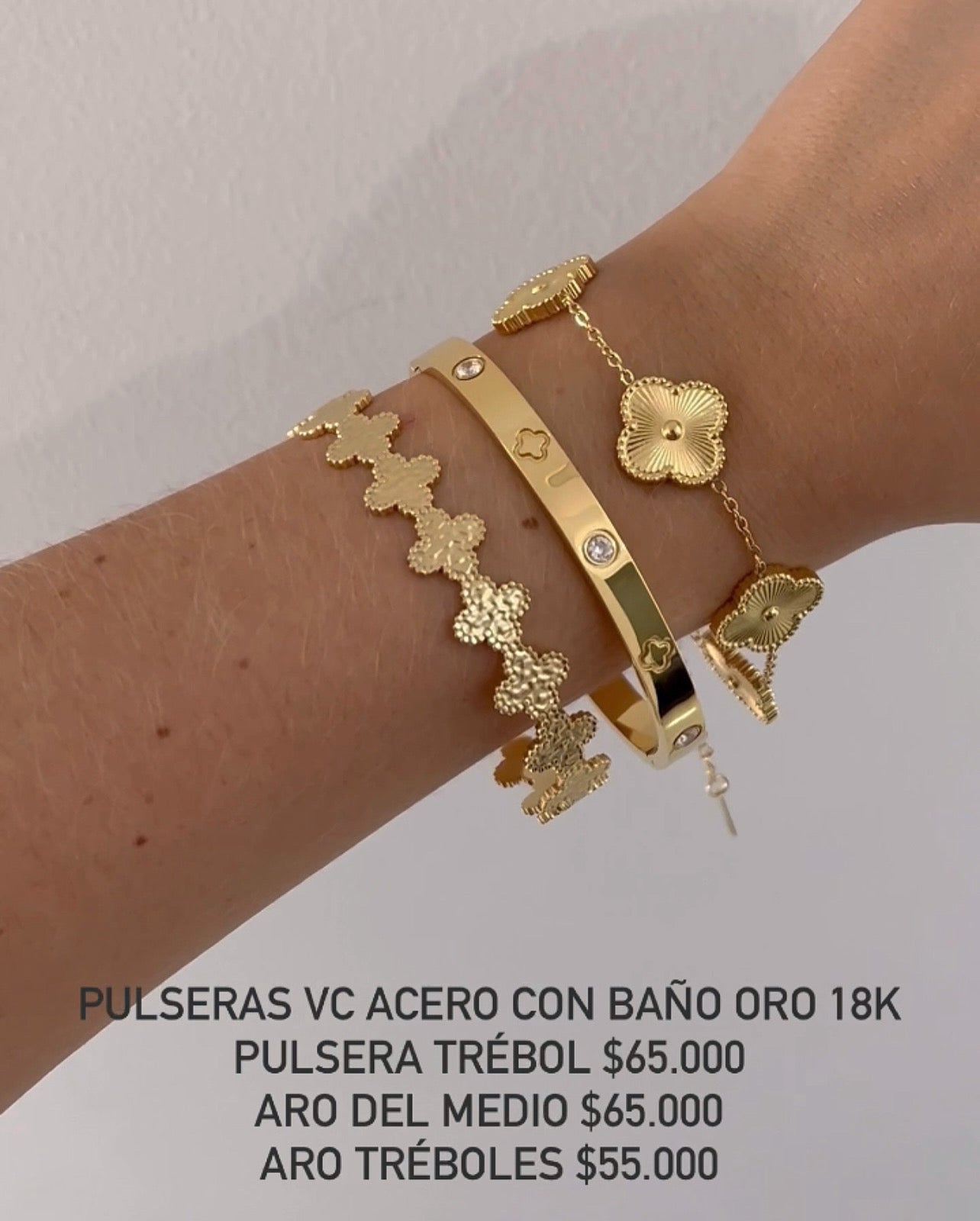 Brazalete acero con baño oro 18k