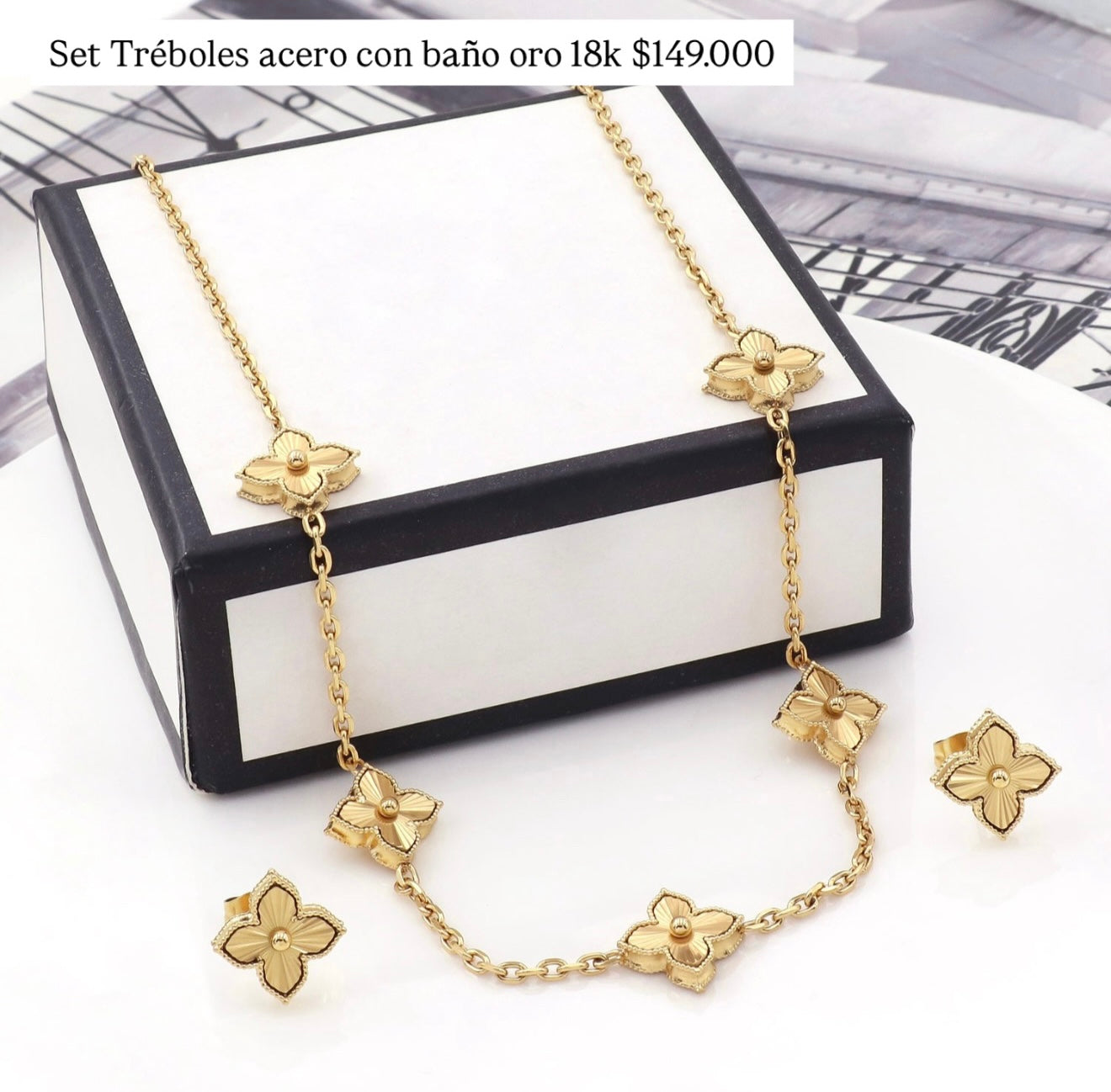 Set acero con baño oro 18k