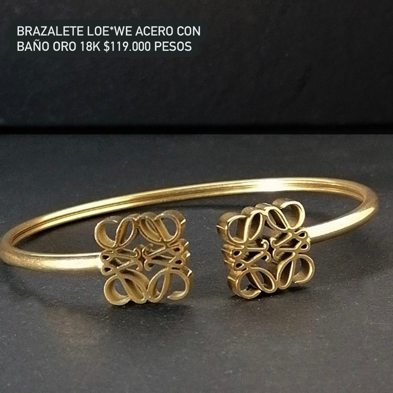 Brazalete acero con baño oro 18k