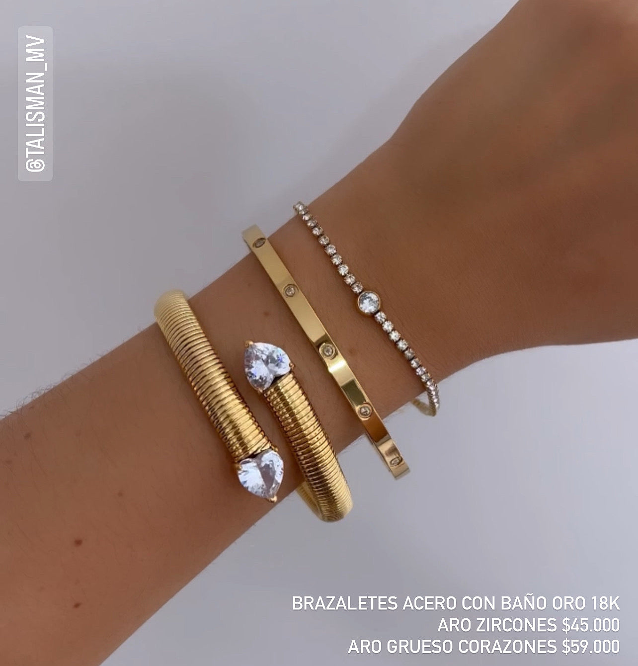 Brazaletes acero con baño oro 18k