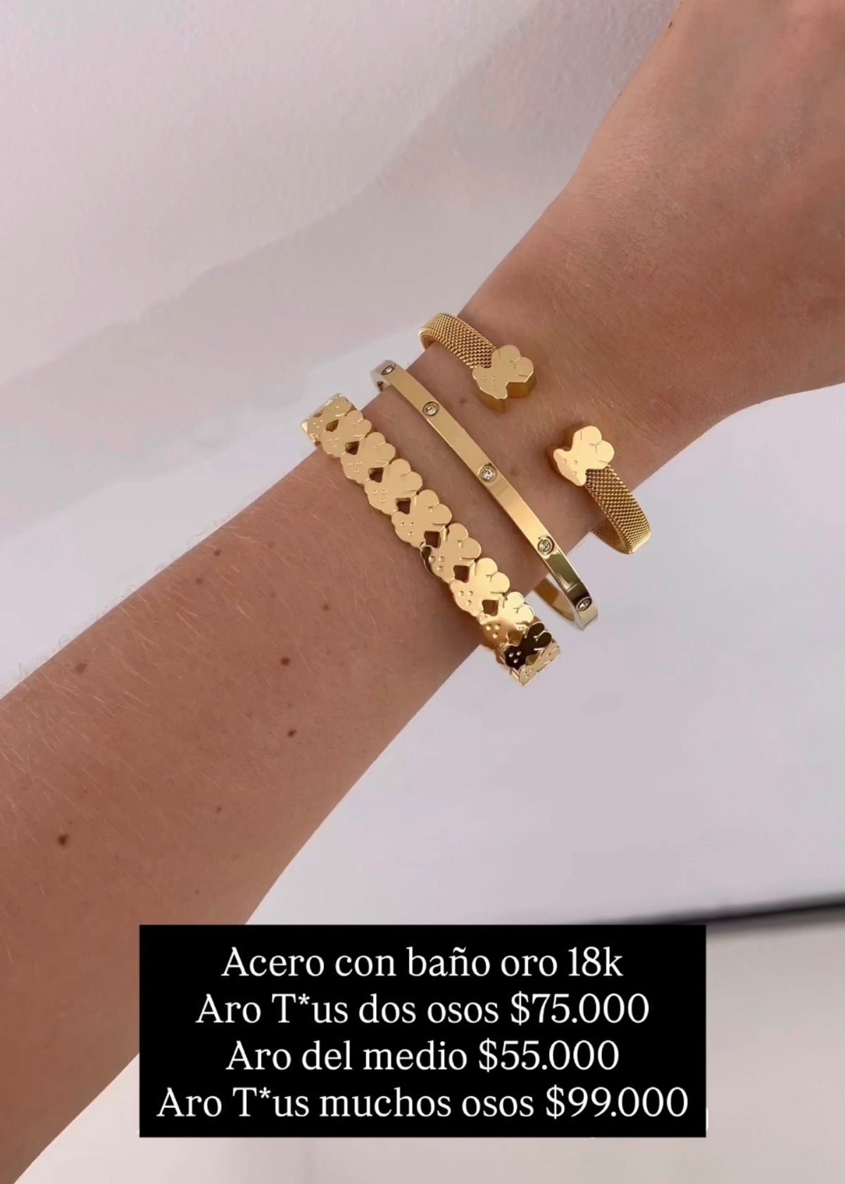 Brazalete acero con baño oro 18k