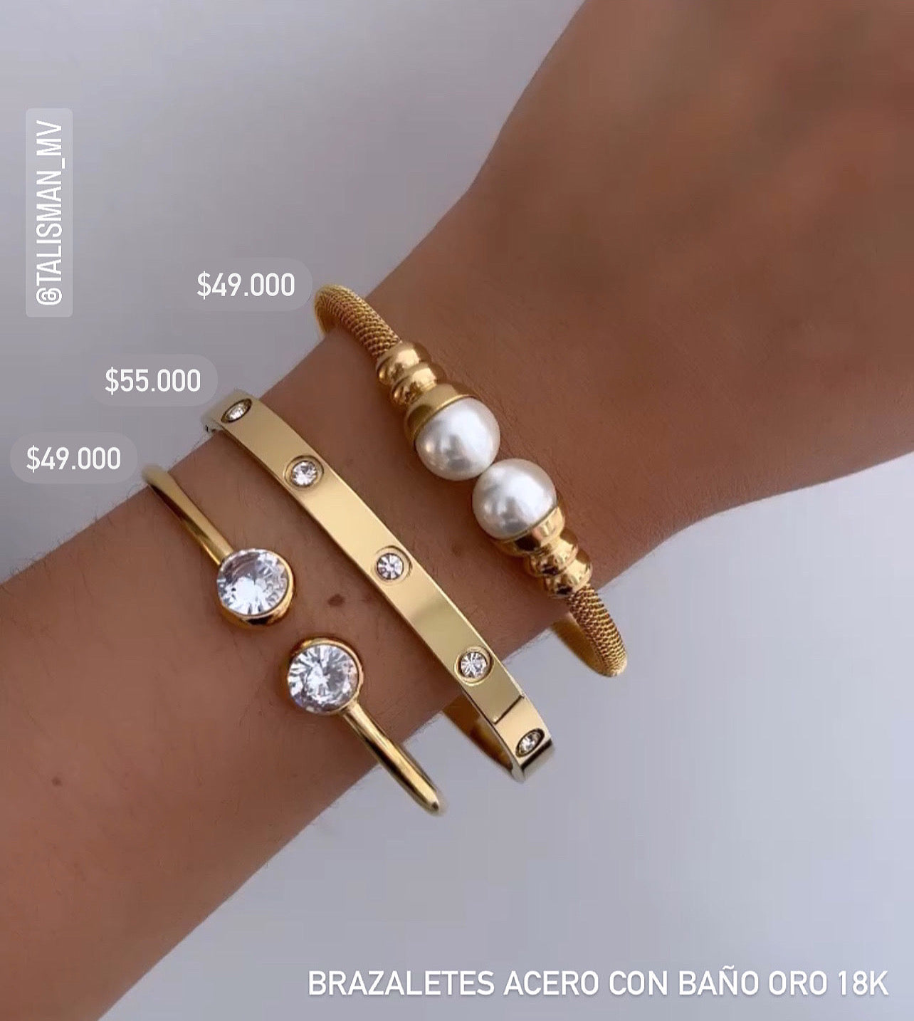 Brazalete acero con baño oro 18k