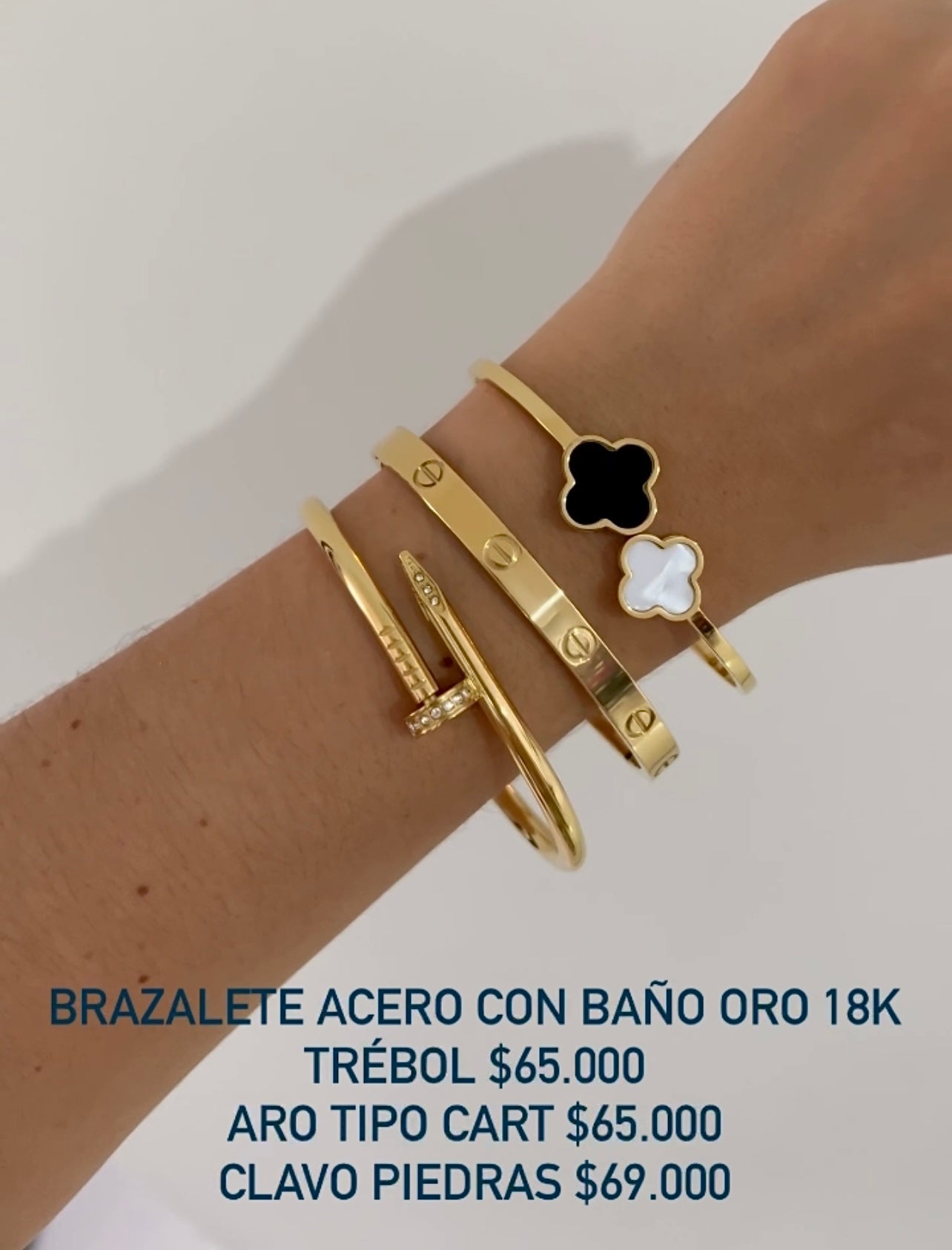 Brazalete acero con baño oro 18k