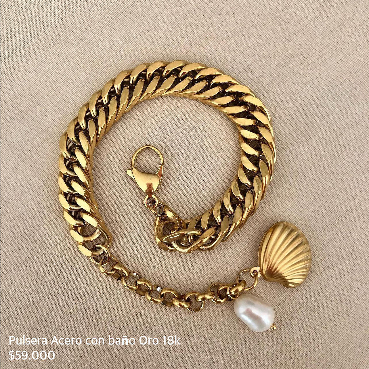 Pulsera Acero con baño Oro 18k
