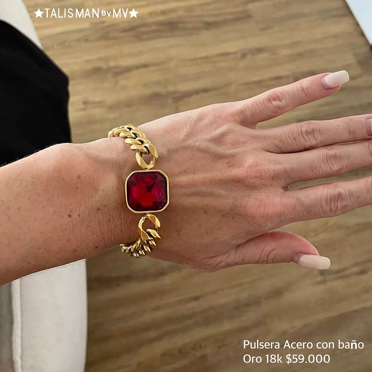Brazalete acero con baño oro 18k