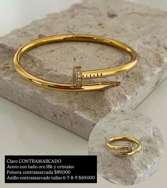 Acero con baño oro 18k (contramarcado)