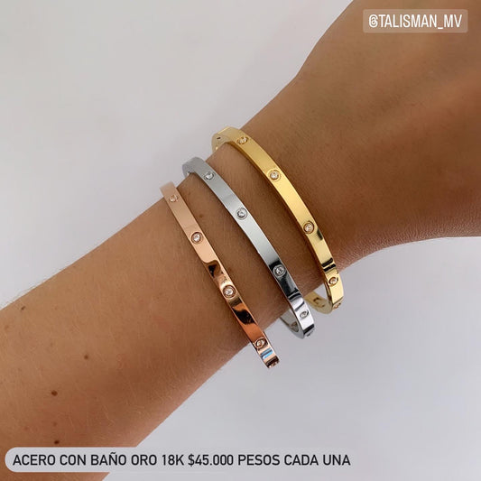 Brazalete acero con baño oro 18k