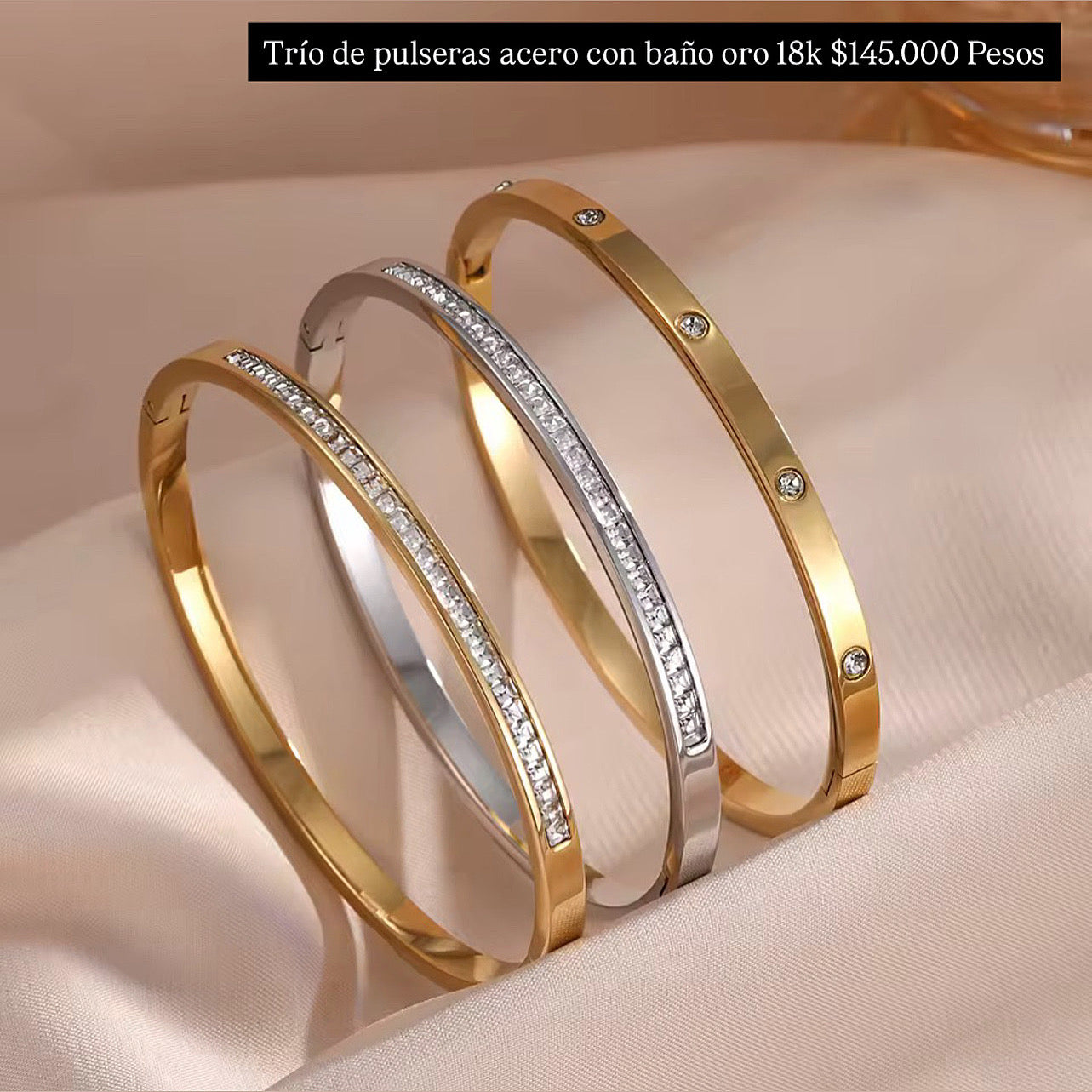 Trío de brazaletes acero con baño oro 18k