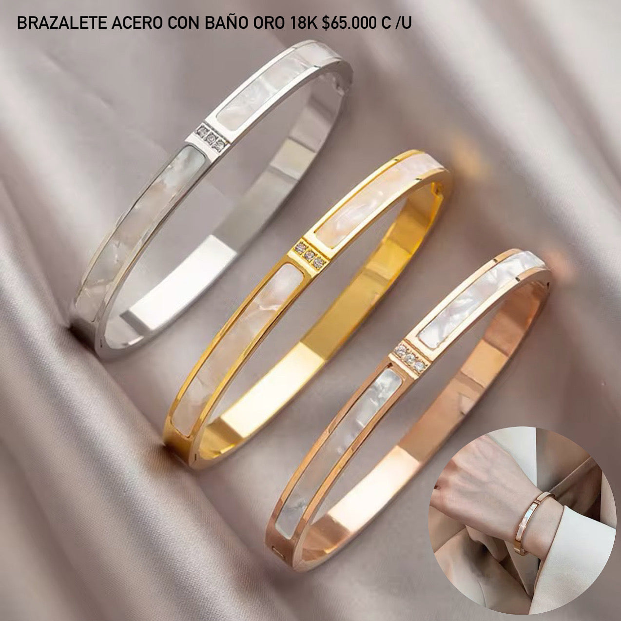 Brazalete acero con baño oro 18k