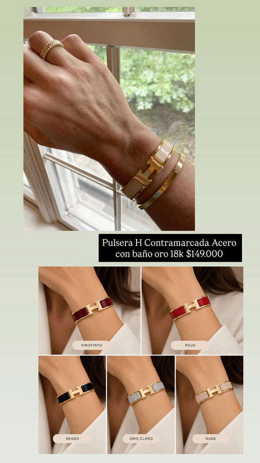 Pulsera Herm contramarcada acero con baño oro 18k