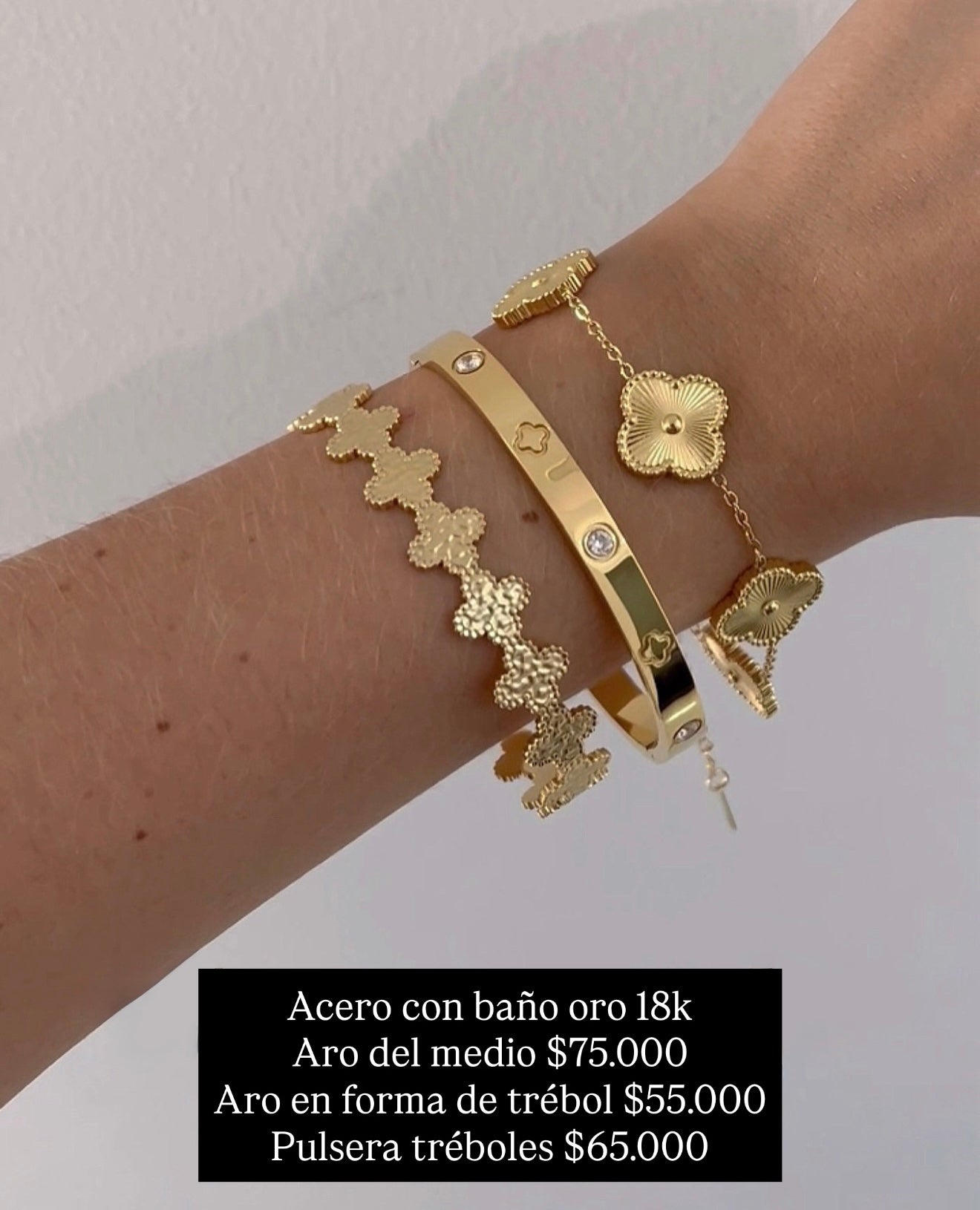 Brazalete acero con baño oro 18k