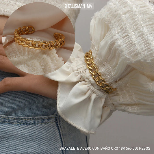 Brazalete acero con baño oro 18k