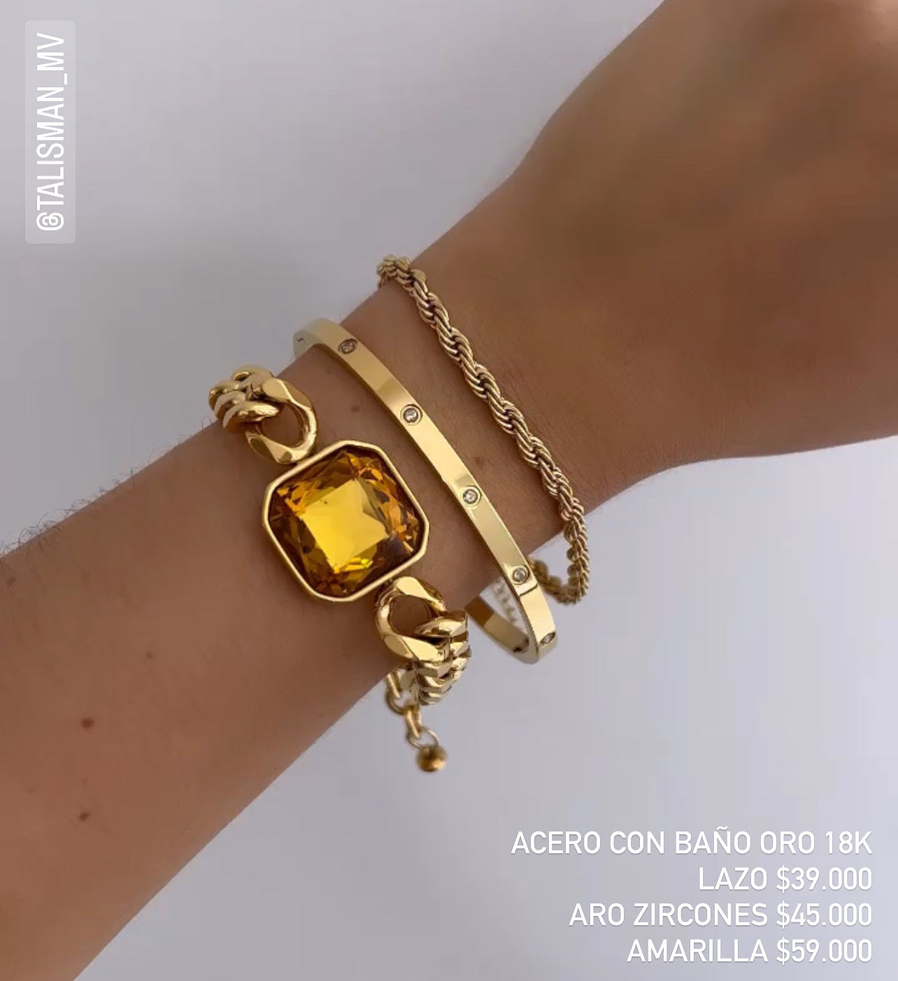 Brazaletes acero con baño oro 18k