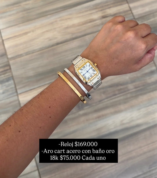 Reloj bicolor, pulseras