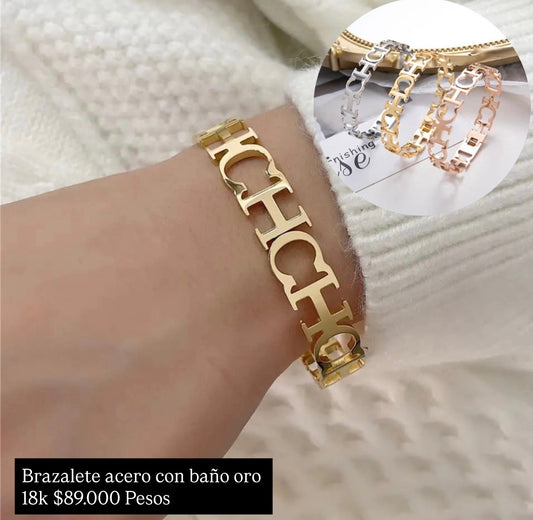 Brazalete acero con baño oro 18k