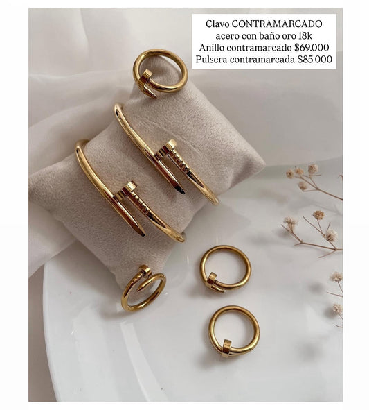 Acero con baño oro 18k (contramarcados)