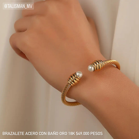 Brazalete acero con baño oro 18k
