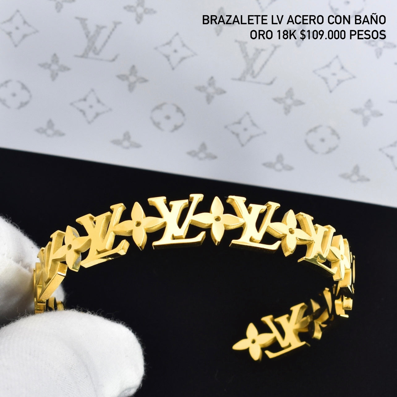 Brazalete acero con baño oro 18k