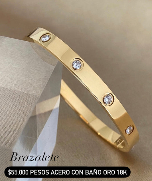 Brazalete acero con baño oro 18k