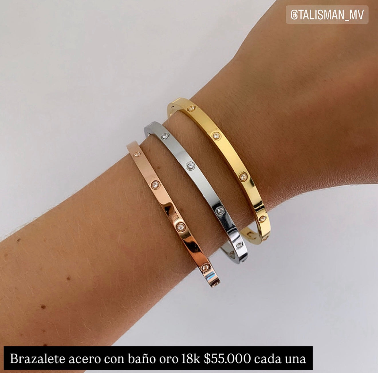 Brazalete acero con baño oro 18k
