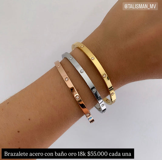Brazalete acero con baño oro 18k