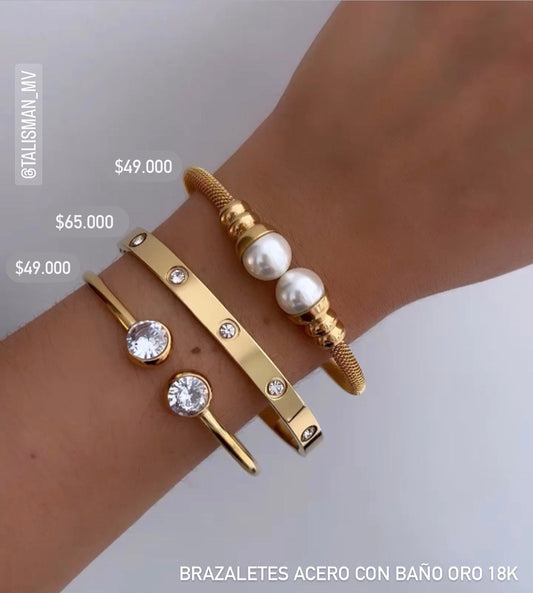 Brazalete acero con baño oro 18k