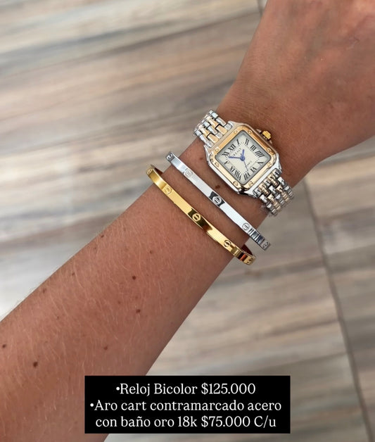 Reloj bicolor, pulseras cart