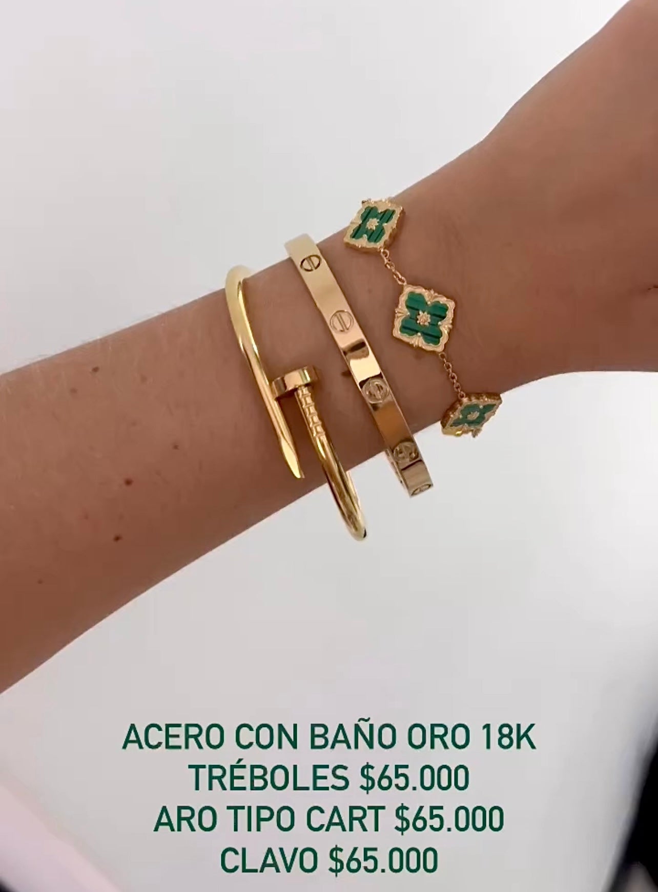 Brazalete acero con baño oro 18k