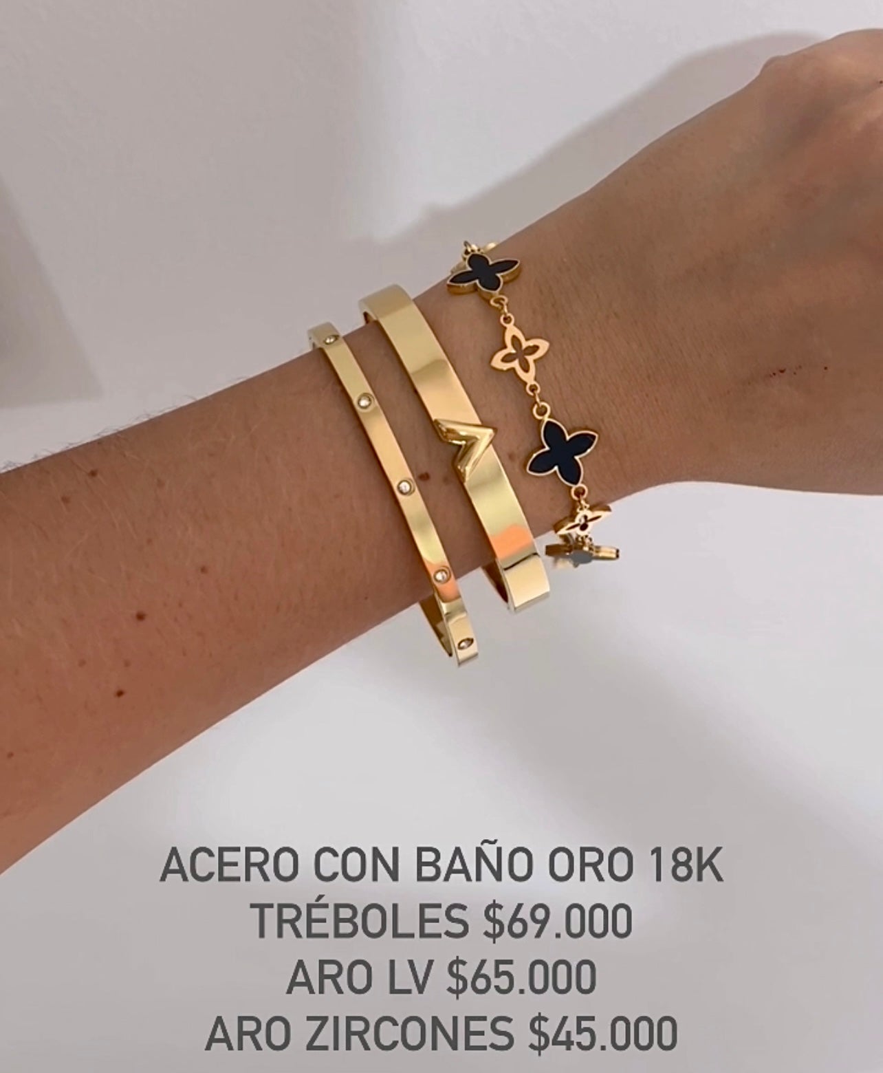 Brazalete acero con baño oro 18k