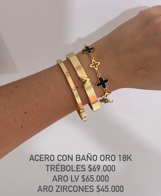 Brazalete acero con baño oro 18k