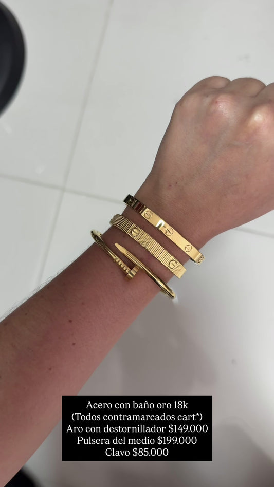 Pulsera acero con baño oro 18k (todas son contramarcadas Cart*)