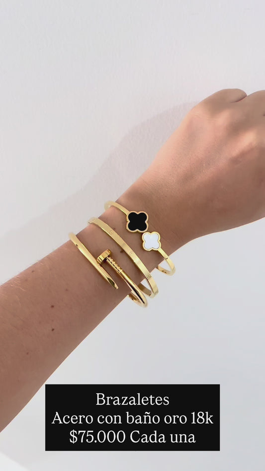 Brazalete acero con baño oro 18k