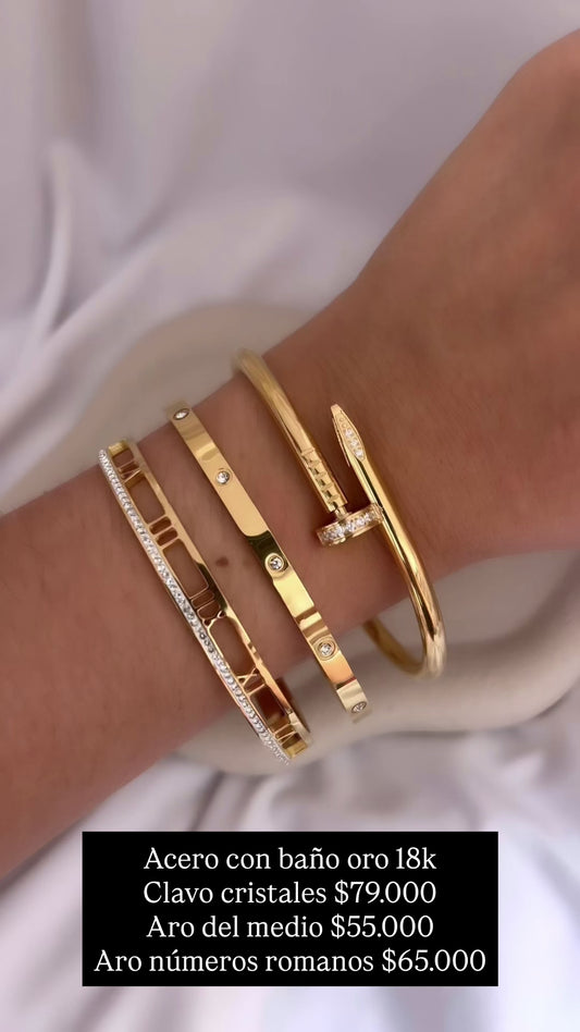 Brazalete acero con baño oro 18k