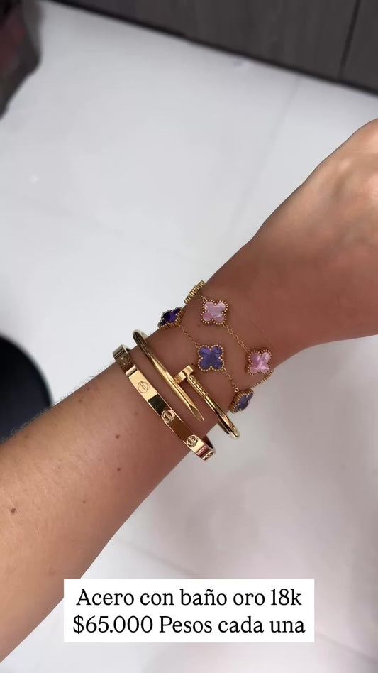 Acero con baño oro 18k