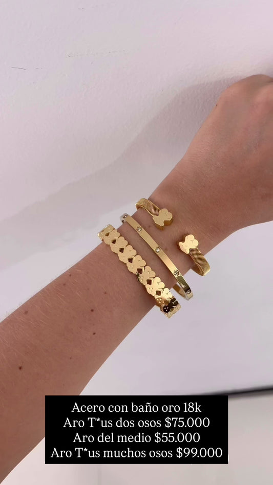 Brazalete acero con baño oro 18k