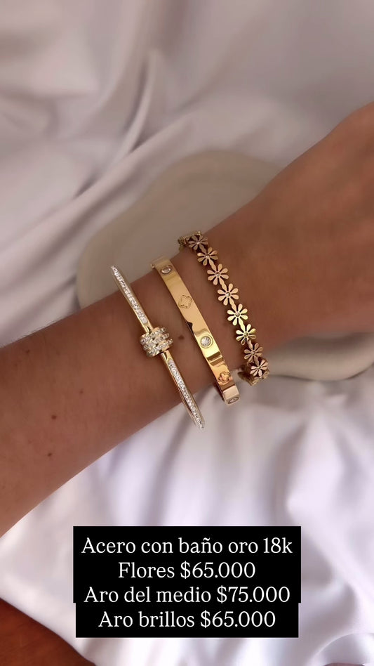 Brazalete acero con baño oro 18k