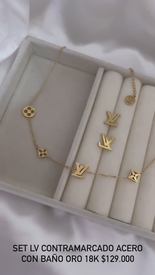Set acero con baño oro 18k